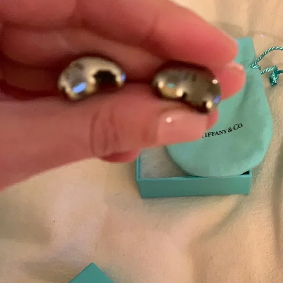 Authentic brand new Tiffany cufflinks with pouch.Rare and limited edition. Must!